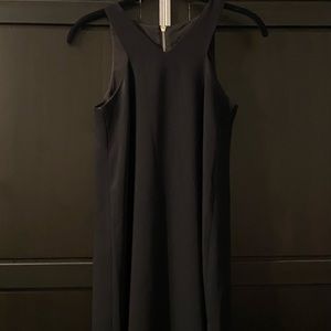 Elegant black Armani Exchange sized 0 with stunning neck design.